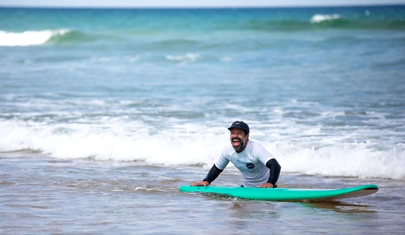Pedro paddling out at Praia da Areia Branca