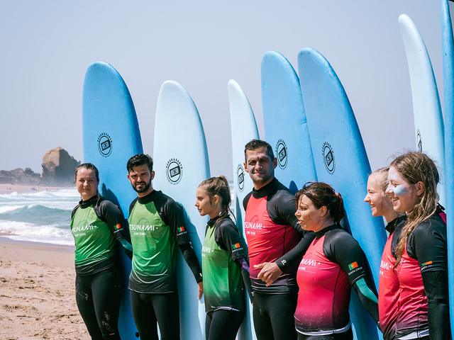 A full Tsunami group with boards on Santa Cruz beach